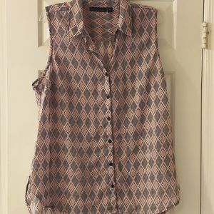 Sheer pink and black patterned sleeveless blouse